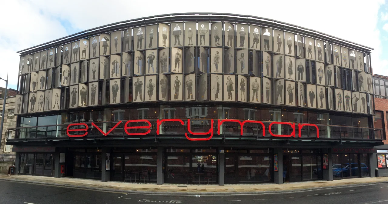 The rebuilt Everyman Theatre in Liverpool, with portrait shutters above its red sign.